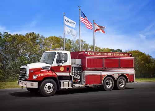 Pierce tanker side profile showing pump panel, hose connections, and tank body
